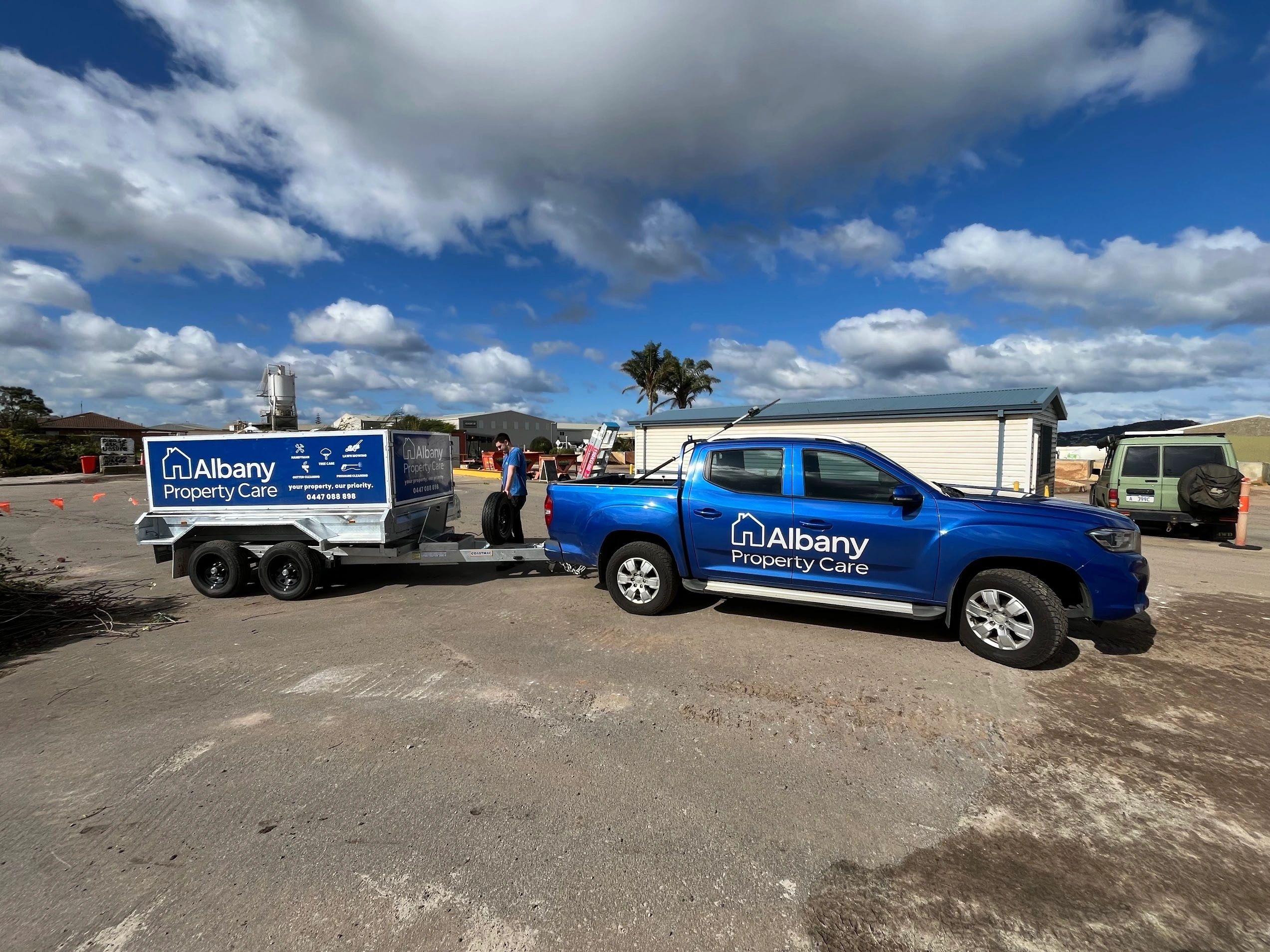 Albany Property Care branded ute and trailer